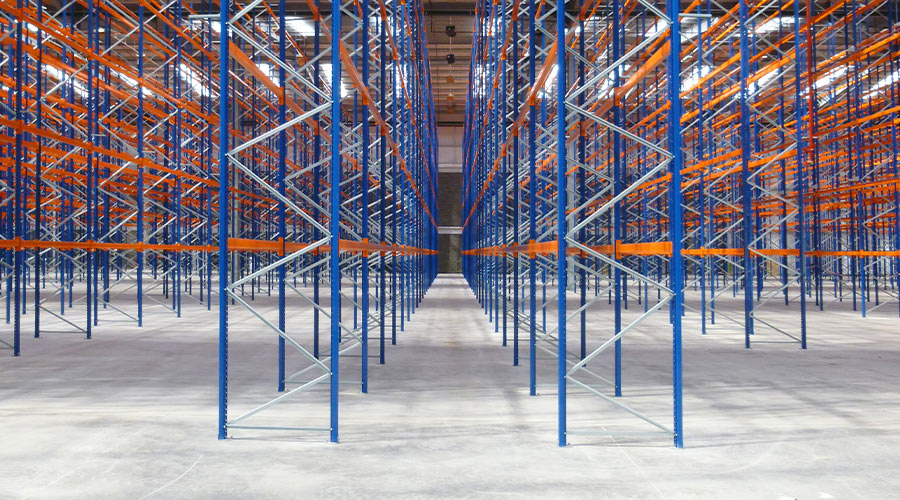 very narrow aisle pallet racking in an empty warehouse