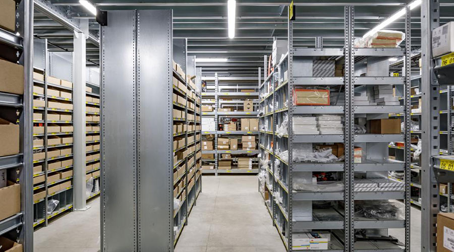 archive shelving storage system in a busy warehouse