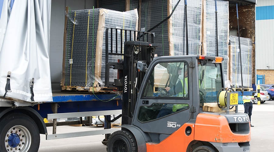 drive-in racking being installed by a fork lift
