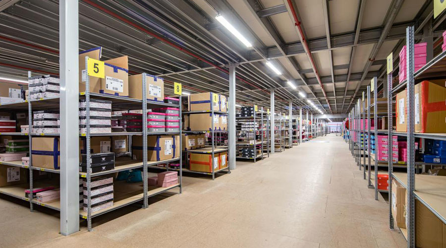 free-standing lightweight shelving system in a warehouse