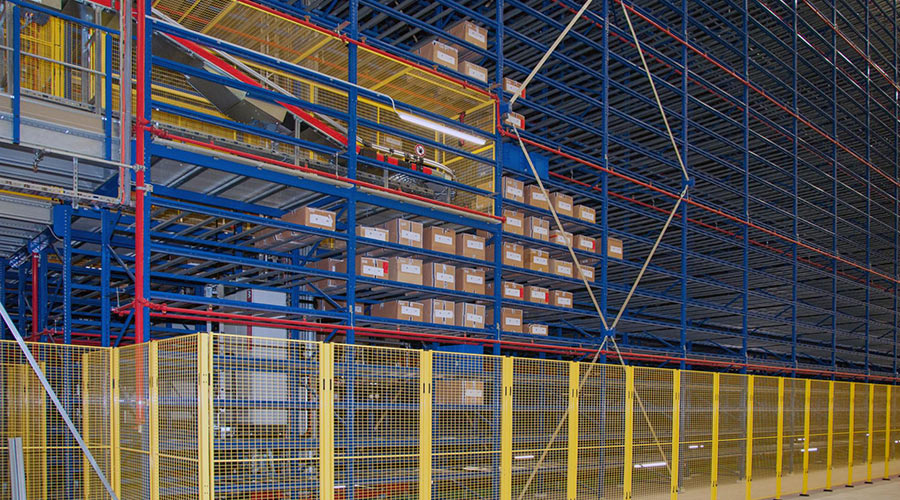 Miniload multi-store shelving system in a warehouse