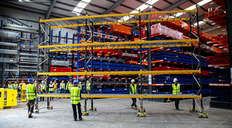 warehouse workers mobilising racking